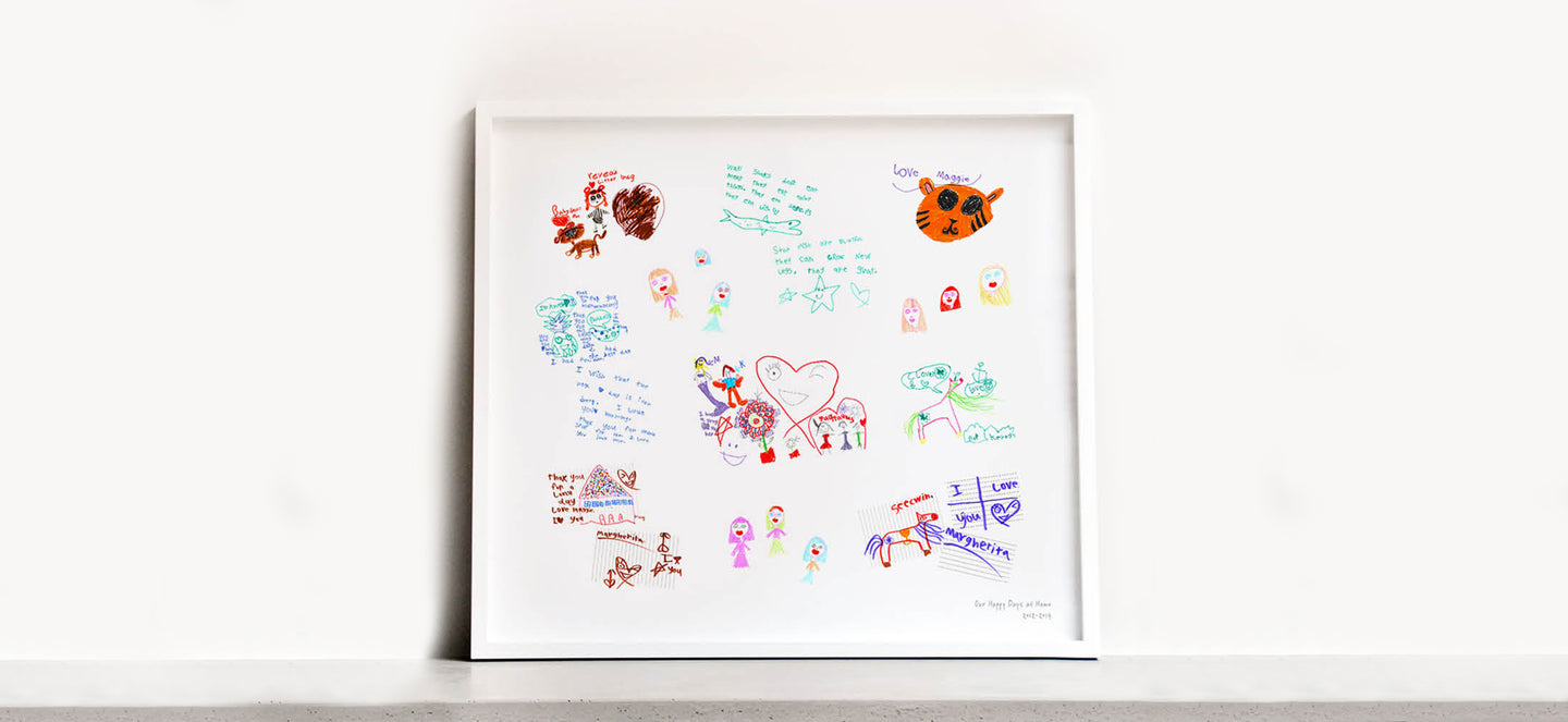 A framed collage of children's drawings scattered around