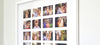  A close up of a framed photo collage with multiple family photographs arranged in a grid pattern