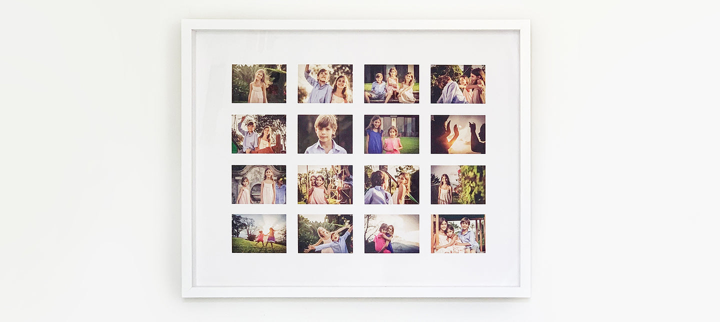 A collage on a wall with multiple family photographs arranged in a grid pattern